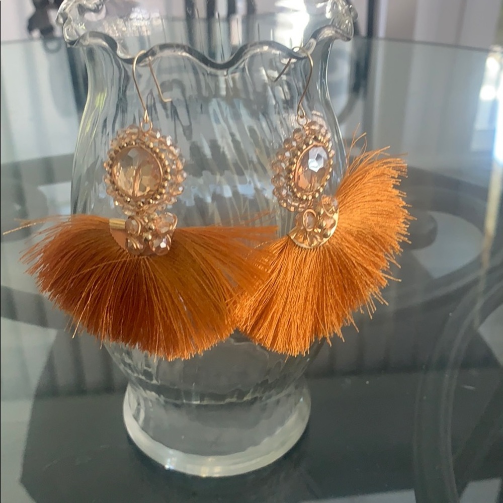 Mustard colored earrings. Brand new.